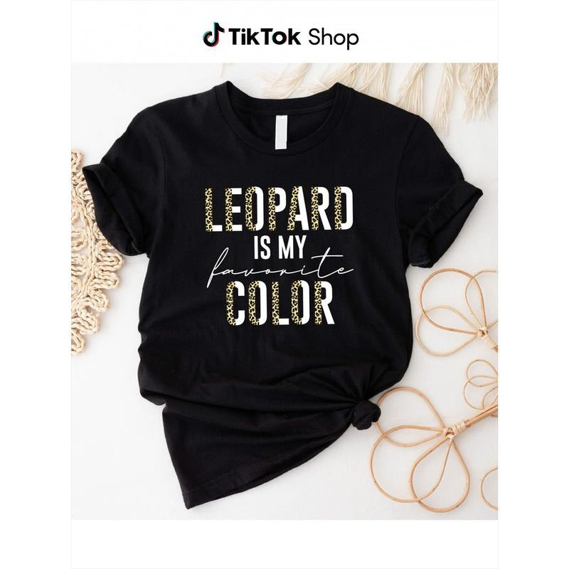 1pc 180g Leopard Print T-Shirt for Men & Women - Black with Golden & White Lettering "Leopard IS MY Favorite COLOR"...