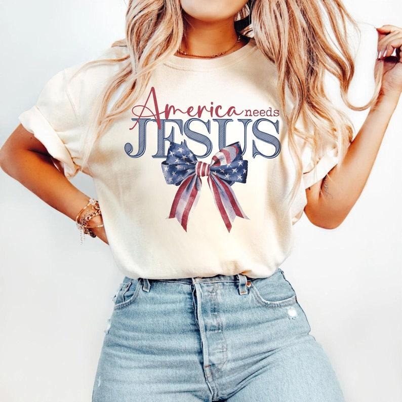 America Needs Jesus Coquette Bow Watercolor Designs Christian Patriotic Shirt Designs DTF Transfer 4th of July Hoodie,...
