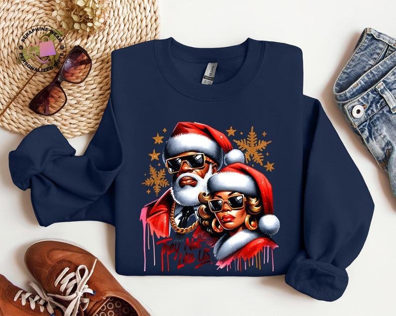 Black Christmas Couples They're Not Like Us Unisex Sweatshirt, Xmas African American Santa Sweater, Mr and Mrs Claus...