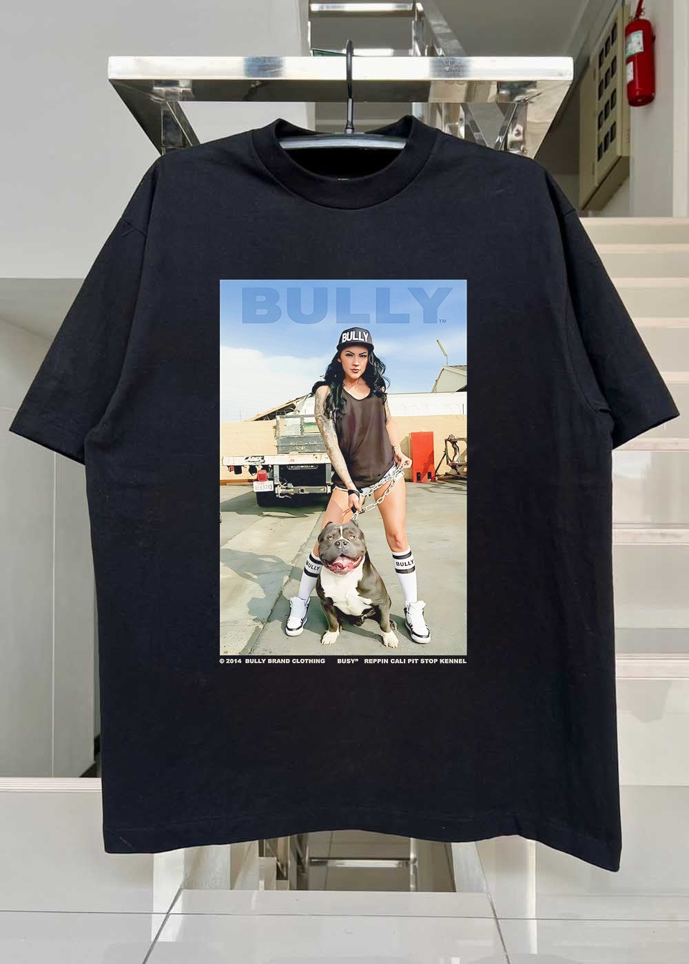 Bully Brand Clothing Busy Reppin Cali Pit Stop Kennel Woman Standing with Dog T-Shirt