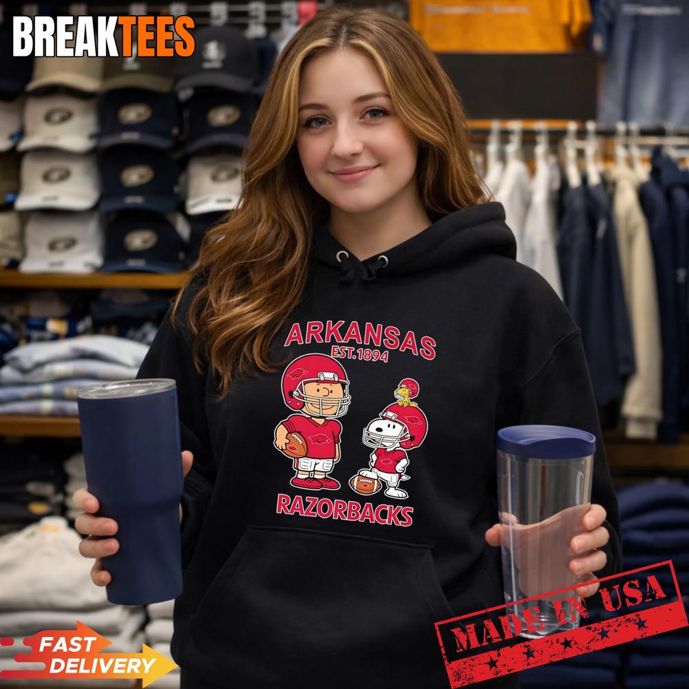 Charlie Brown Snoopy and Woodstock wearing Arkansas Razorbacks jersey NFL est 1894 T-Shirt