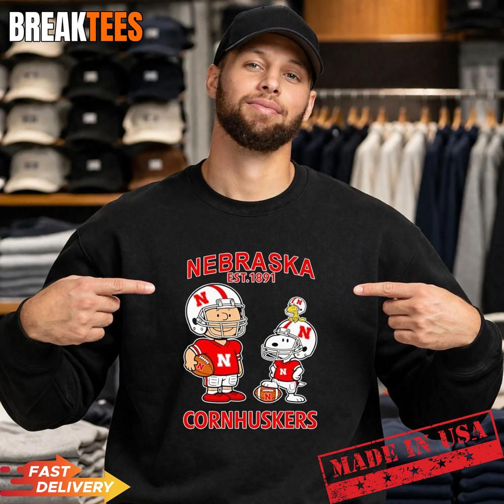 Charlie Brown Snoopy and Woodstock wearing Nebraska Cornhuskers jersey NFL est 1891 T-Shirt