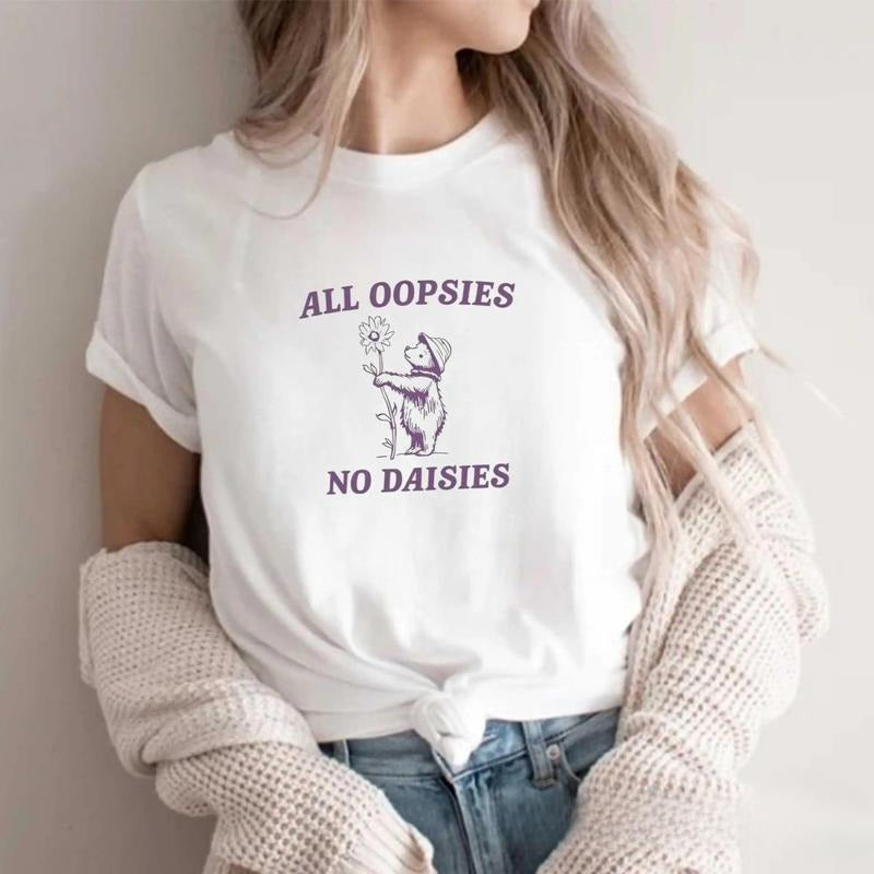 Charming T - Shirt with an Adorable Bear Holding a Daisy and the Whimsical Phrase "All Oopsies No Daisies" - A Delight...
