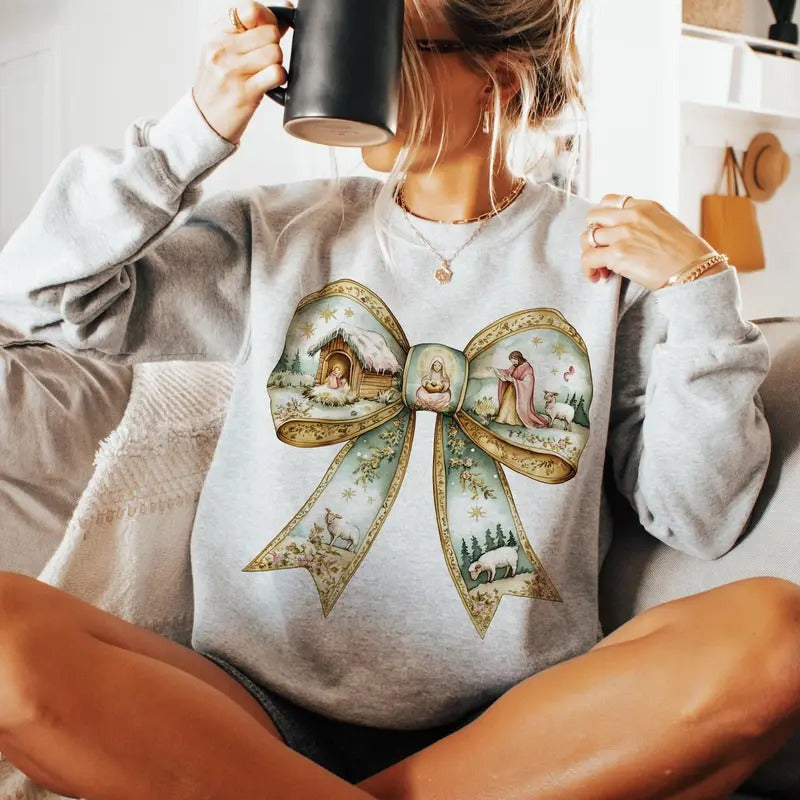 Christmas Nativity Bow Graphic Long Sleeve Sweatshirt, Cozy Holiday Outfit Hoodie, Religious Christmas Apparel T-Shirt...