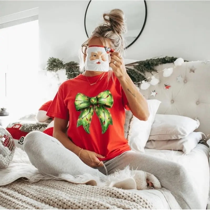 Comfort Colors Grinch Lights Coquette Bow Women's Short Sleeve Graphic T-Shirt