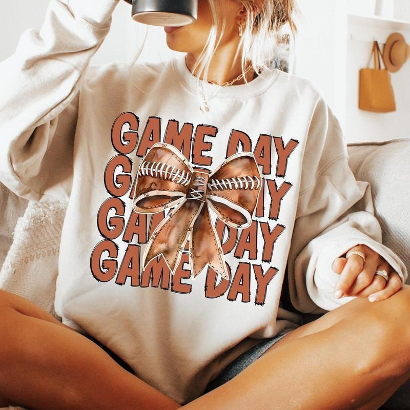 Coquette Football Shirt, Football Sweatshirt, Game Day Sweatshirt,  Unisex Classic Cotton with Graphic Print in All...