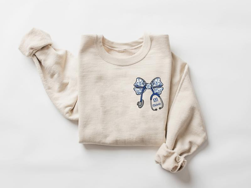 Custom Bow Sweatshirt for RN Nurse, Gift for Nurse, Nurse Coquette Sweater, Nurse Bow Ribbon Stethoscope, Personalized...