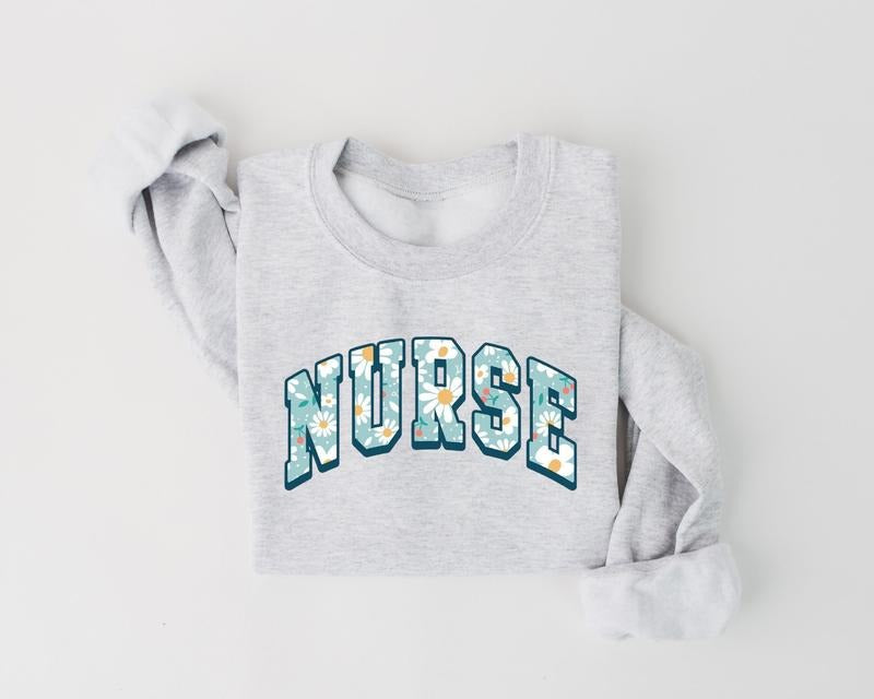 Daisy Nurse Shirt, Floral Nurse Sweatshirt, Nurse Appreciation, Nursing School Tee, ER RN NICU Graphic Tee Hoodie