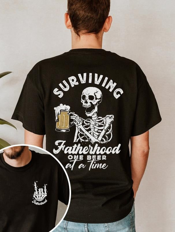 Fatherhood Surviving One Beer At a Time T-Shirt Fatherhood Back & Font Shirts Skull Dad Tee Sarcastic Shirt Gift For Dad...