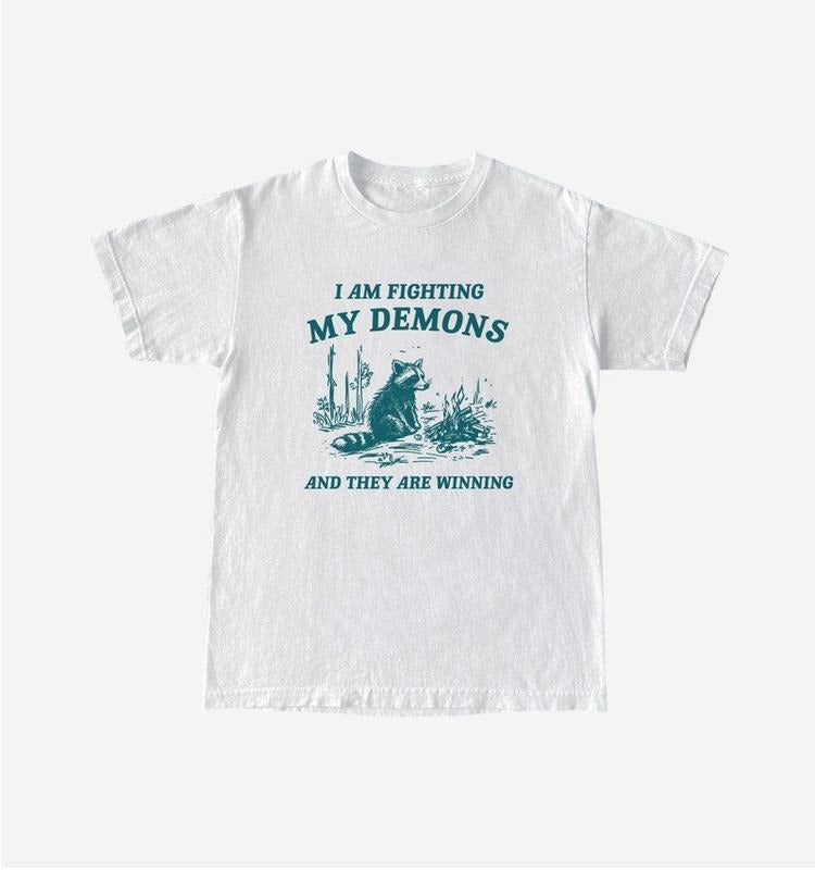 Funny Meme Shirt, I Am Fighting My Demons Tee, Raccoon Gift Unisex T-Shirt Hoodie, Sweatshirt | UrbanDripWear.com