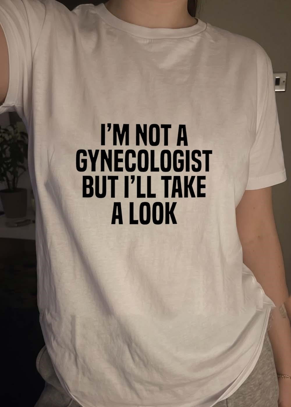Funny Slogan Apparel I’m Not a Gynecologist But I’ll Take a Look T-Shirt