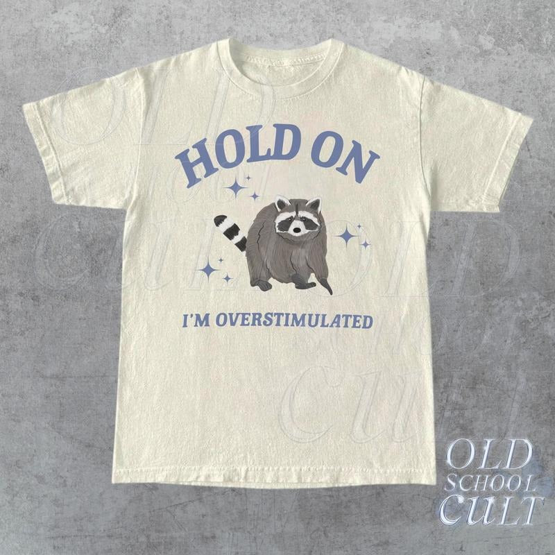 Hold On I'm Overstimulated T-Shirt, Retro Unisex Adult T Shirt, Funny Raccoon Shirt, Meme T Shirt, Relaxed Cotton...