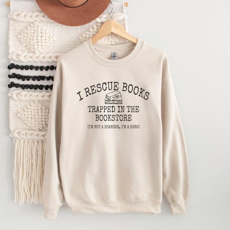 I Rescue Books Trapped In The Bookstore, I'm Not A Hoarder I'm A Hero Shirt Or Shirt, Funny Book Lover Gift 39F4B Hoodie,...