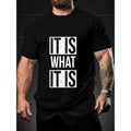 "IT IS WHAT IT IS" Funny Text Print Crew Neck Short Sleeve T-shirt For Men, Casual Summer T-Shirt For Daily Wear And Vacation Resorts made in usa
