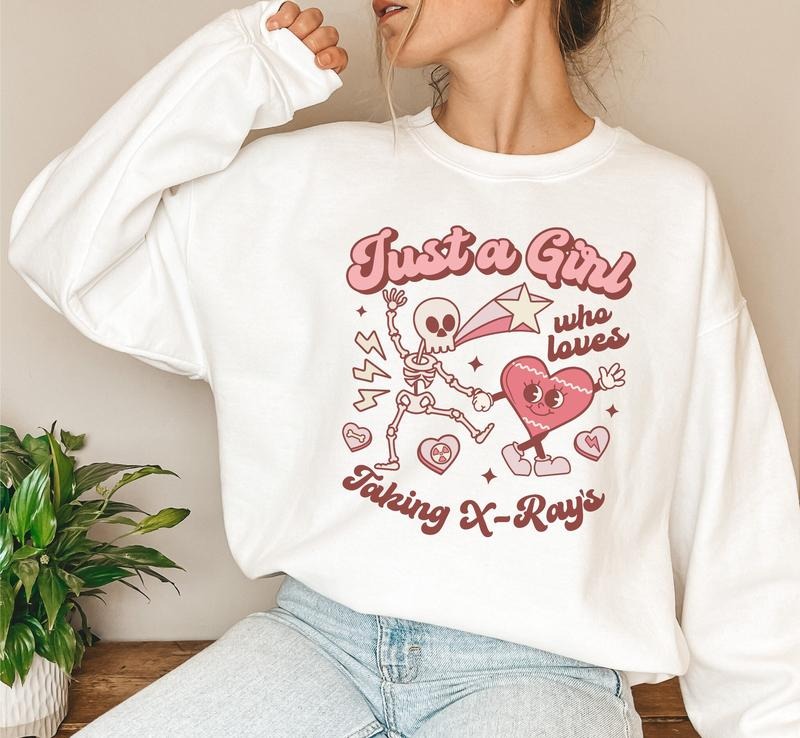 Just A Girl Who Loves X-Rays Sweatshirt, Skeleton Rad Tech Valentines Sweater Best Price T-Shirts, Hoodie | UrbanDripWear.com