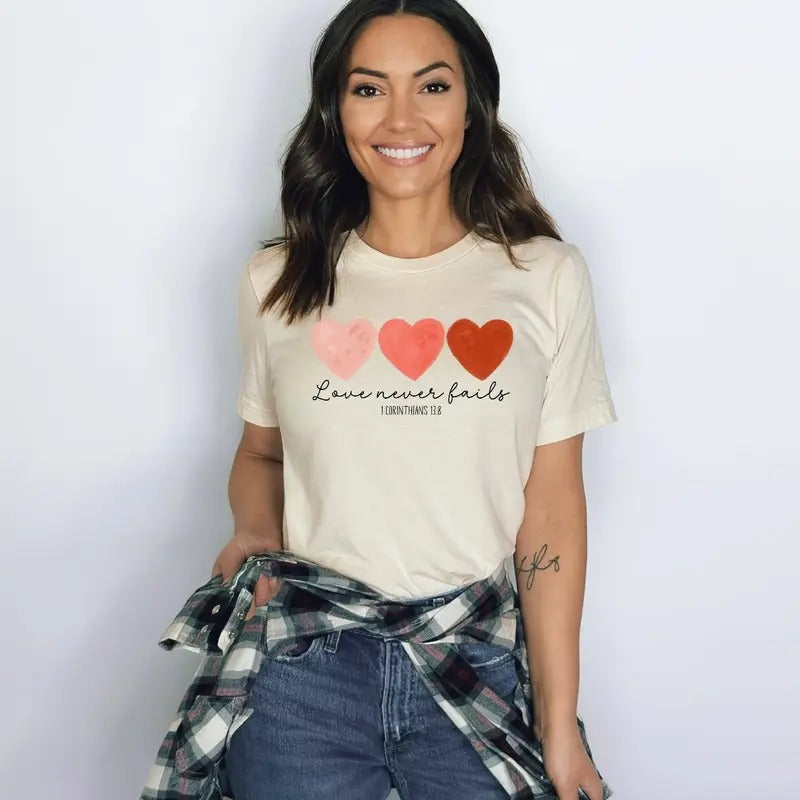 Love Never Fails Graphic Tee -  BELLA+CANVAS Tee - Christian Shirt Hoodie, Sweatshirt | UrbanDripWear.com
