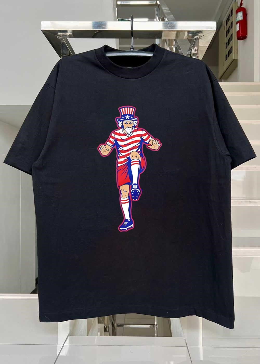 M. Uncle Sam Playing Soccer Graphic T-Shirt