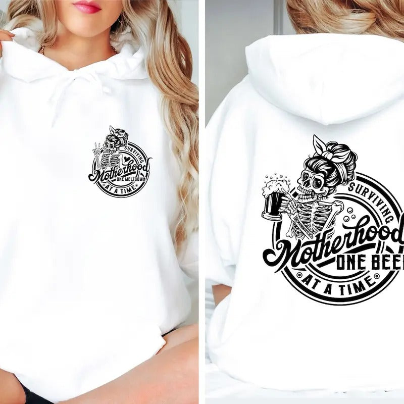 Motherhood surviving one beer at a time shirt Hoodie, Sweatshirt | UrbanDripWear.com
