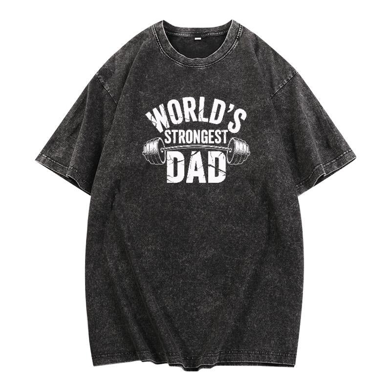 Motivational and Masculine T - Shirt: Celebrate Dad's Strength with a Bold "World's Strongest Dad" Design on a Washed