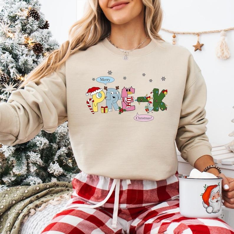 Pre-K Teacher Christmas Sweatshirt, Elephant And Piggie Christmas T-shirt, Very Merry Teacher Shirt, Santa's Favorite...
