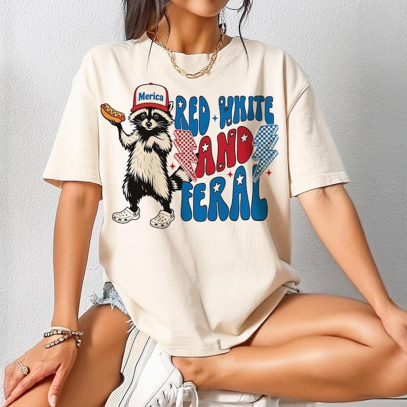 Red White And Feral Shirt, Funny USA Shirt, Funny Raccoon T-Shirt , 4th Of July Tshirt, Hotdog Raccoon Tee Top Womenswear...