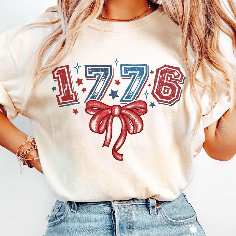 Retro 1776 Coquette tshirt, 4th of July shirt, Vintage America tshirt, Memorial Day shirt, Girly USA sweatshirt,...