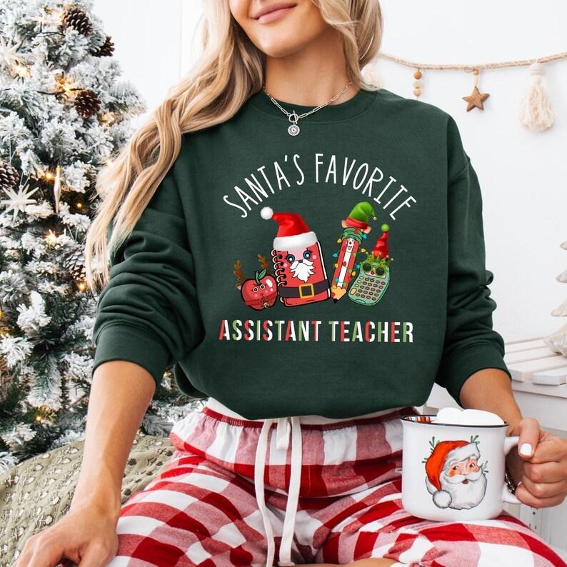 Santa's Favorite Assistant Teacher Sweatshirt, Very Merry Teacher T-shirt, Teacher Aide Christmas Tee, Christmas Teacher...