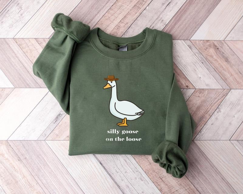 Silly Goose On The Loose Sweatshirt, Silly Goose Sweatshirt, Goose meme Shirt, Cowboy Duck Sweatshirt, Funny Duck,...