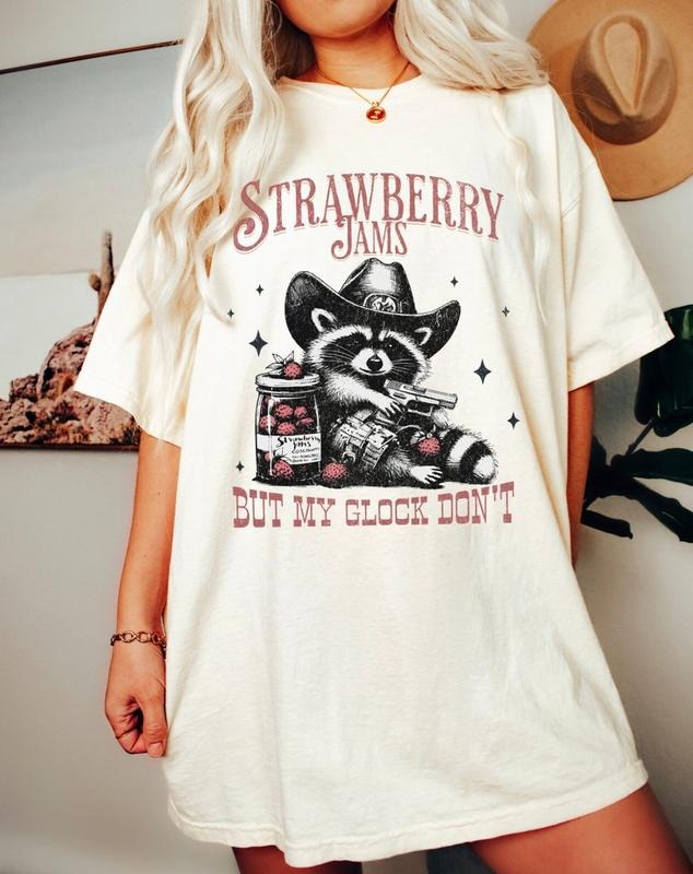 Strawberry Jams But My Glock Don't Funny Raccoon Shirt, Raccoon Meme Tee Hoodie, Sweatshirt | UrbanDripWear.com