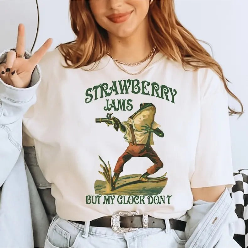 Strawberry Jams But My Glock Don't Shirt , Funny Frog Shirt, Funny Meme Shirt LS838 Hoodie, Sweatshirt | UrbanDripWear.com