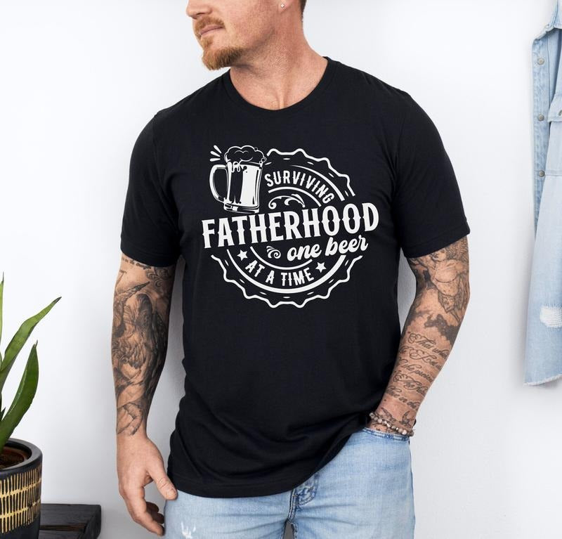 Surviving Fatherhood One Beer At A Time Shirt Funny Father Shirt Husband Shirt Fathers Day Gift Fatherhood Shirt Gift For...
