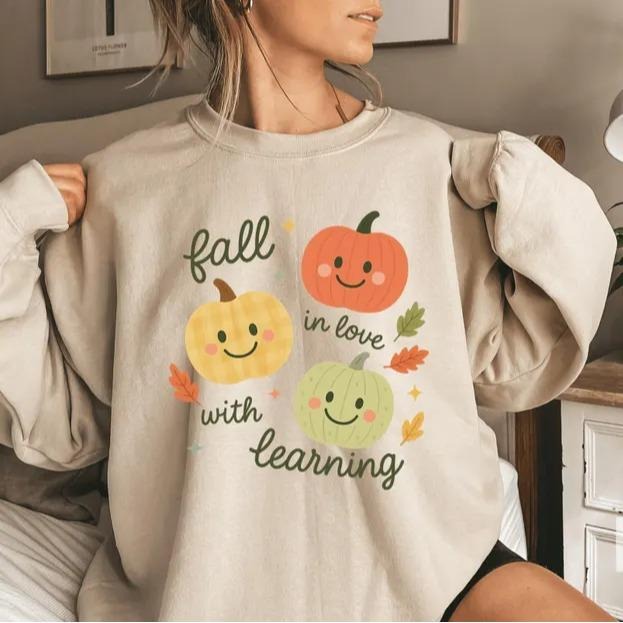 Cute Elementary Teacher Fall Sweatshirt/T-Shirt, Pumpkin Teacher Shirt, Fall in Love with Learning Happy Face Tee,...