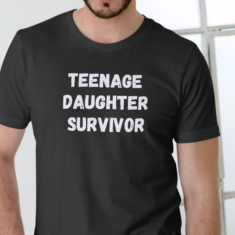 TEENAGE DAUGHTER SURVIVOR T Shirt, 100% cotton, unisex Menswear Stylish Top Streetwear Hoodie, Sweatshirt | UrbanDripWear.com