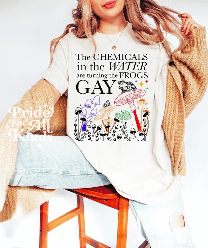 The chemicals in the water are turning the frogs gay shirt | gay frog shirt | lgbtq pride | queer frog | goblincore |...
