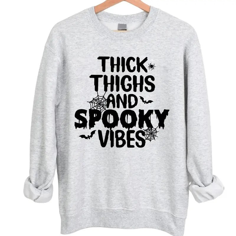 Thick Thighs and Spooky Vibes Halloween Crewneck Sweatshirt Hoodie Tshirt, Halloween 2024 Gifts | UrbanDripWear.com