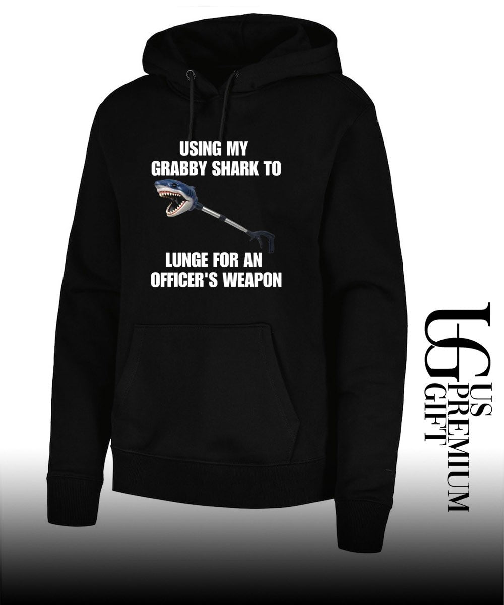 Using my grabby shark to lunge for an officer’s weapon shirt