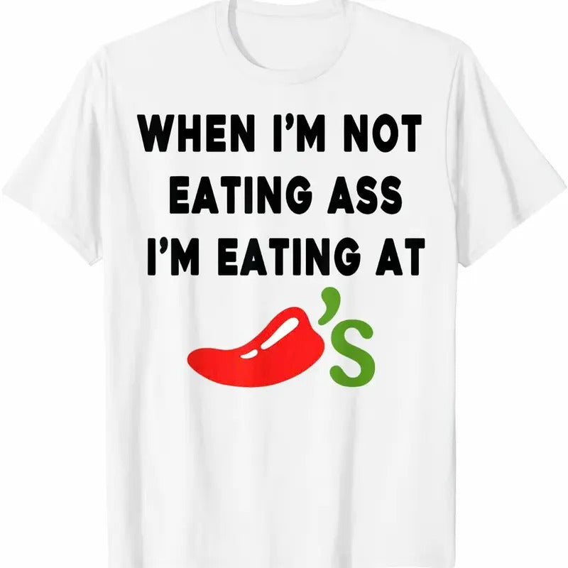 When I'm Not Eating @ss, I'm Eating At Chilis Funny T-Shirt, Trending 2025 Shirt Funny Hoodie, Sweatshirt | UrbanDripWear.com