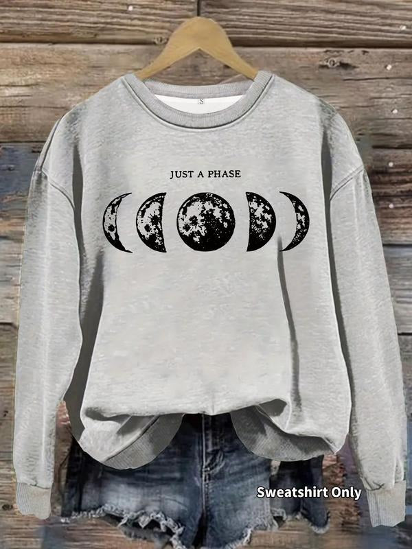 Women's Casual Just a Phase Graphic Pullover Sweater, Soft Long Sleeve Round Neck Sweatshirt, All-Season Wear T-Shirts,...
