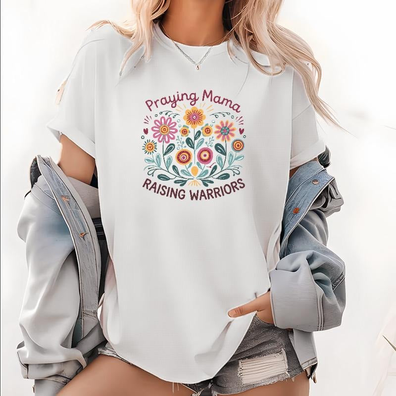 Women's T - Shirt Celebrating Motherhood: "Praying Mama RAISING WARRIORS" Slogan with Colorful Floral Graphic style 02...