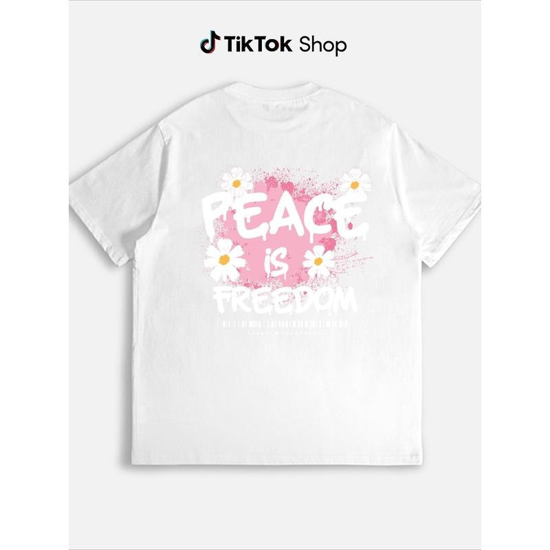 "Women's T - Shirt Embodying Peace and Freedom, Showcasing the Inspiring Phrase 'PEACE is FREEDOM' with Daisy Graphics"...