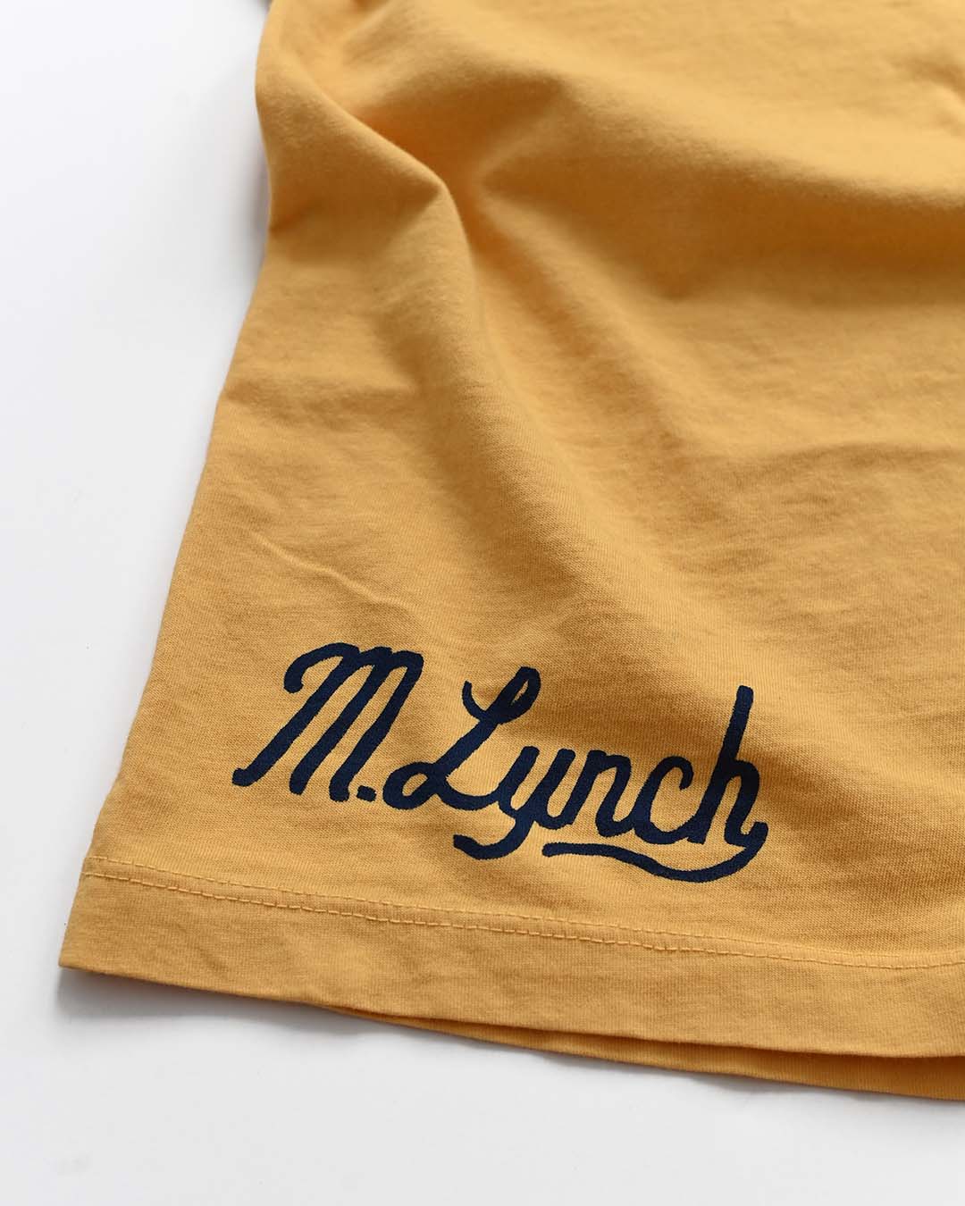 CAL - Marshawn Lynch #10 Gold Tee