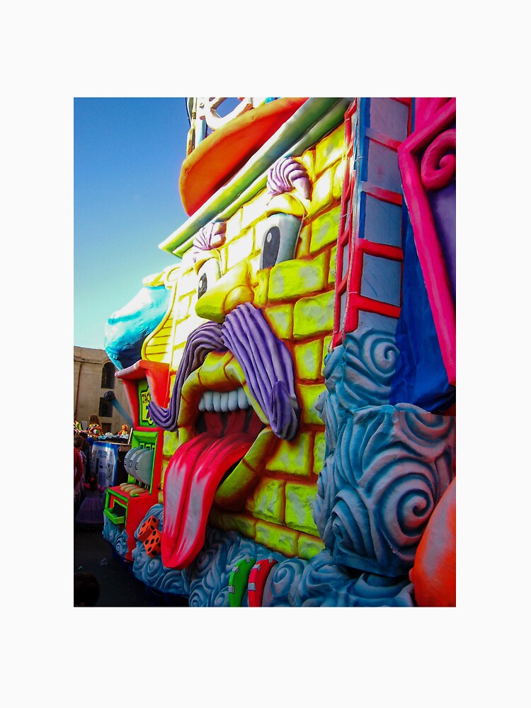 Colorful Carnival Parade Float With Giant Cartoon Face Tongue Out And Purple Mustache by Nmallia
