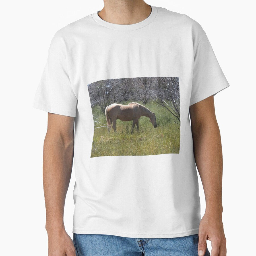 tan horse in a meadow by Stephanie  Skeem