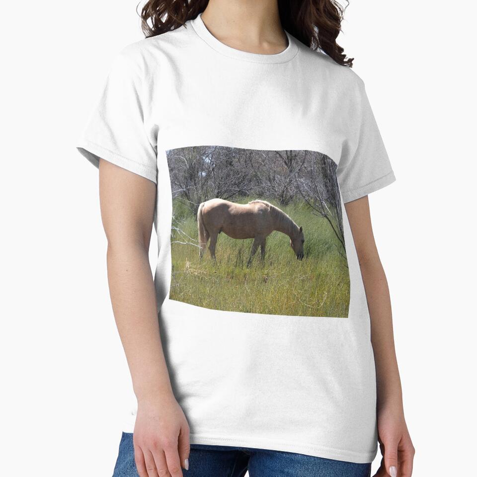 tan horse in a meadow by Stephanie  Skeem