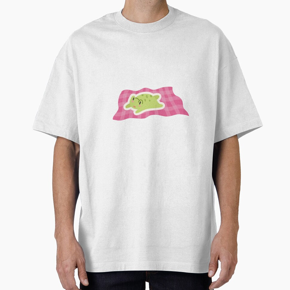 Cozy Frog on a Blanket – Cute Relaxing Frog Illustration by Geafixy