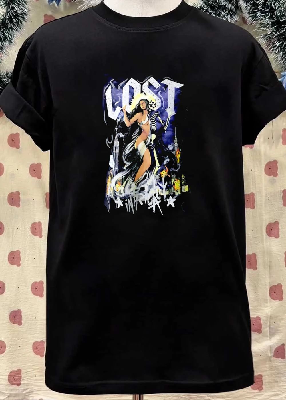 Lost goddess skeleton and city skyline shirt