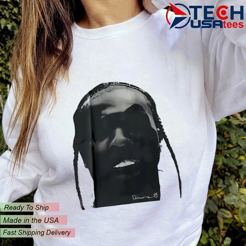 Travis wearing Pop Smoke swag head shirt
