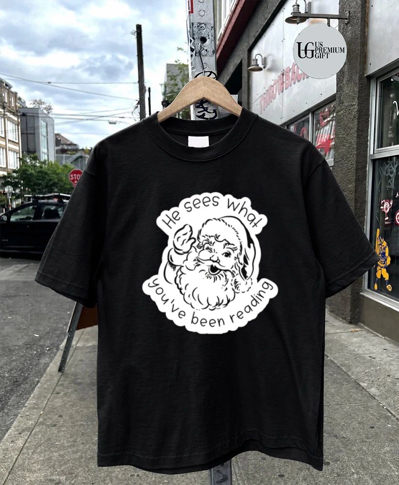 Santa Claus he sees what you’ve been reading shirt