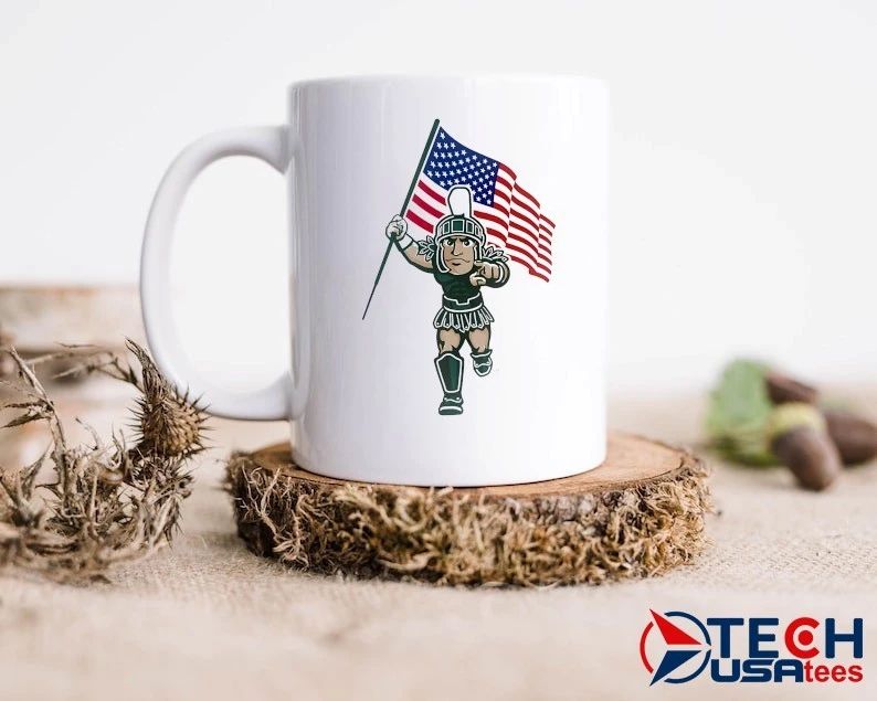 Michigan State Spartans mascot holding USA flag shirt