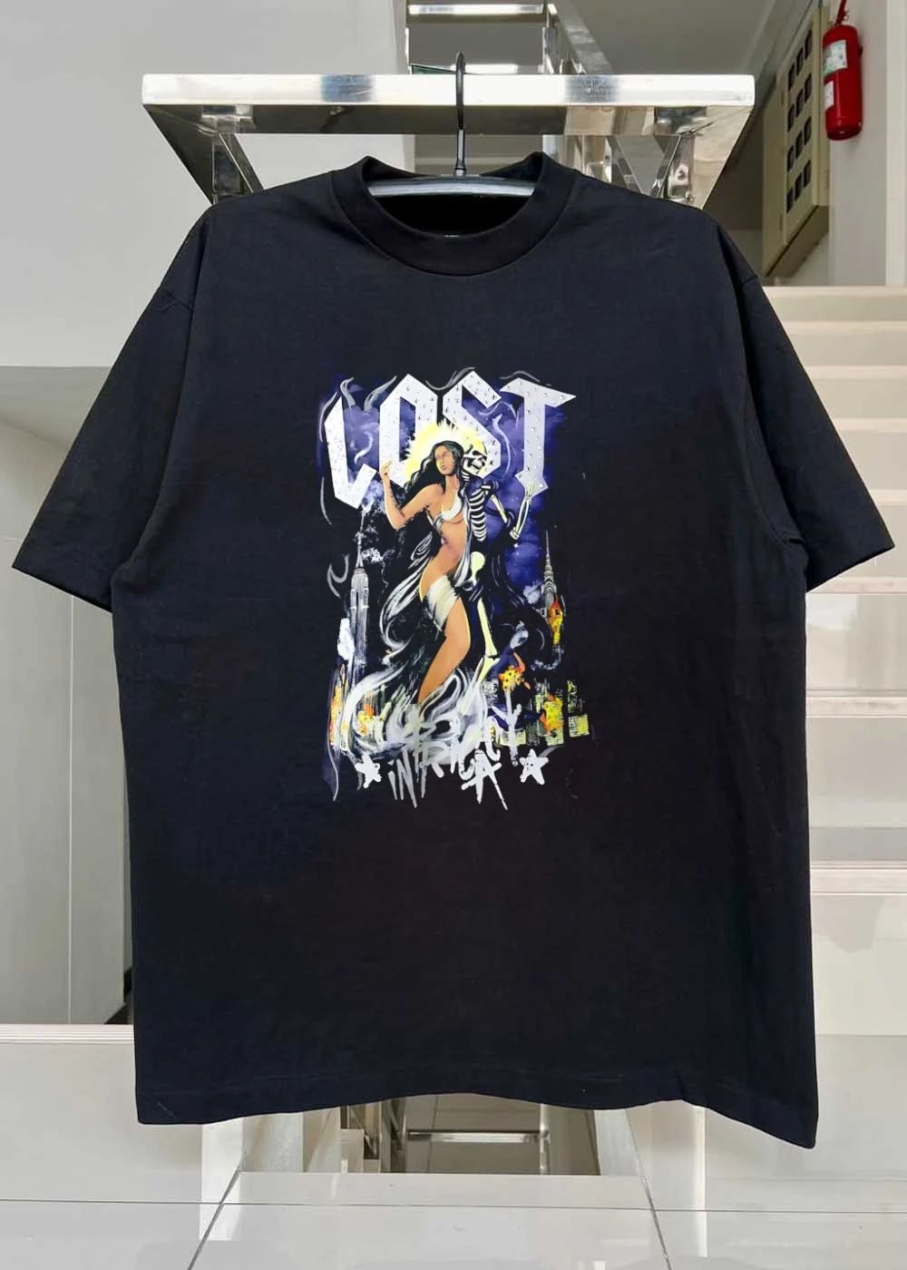 Lost goddess skeleton and city skyline shirt